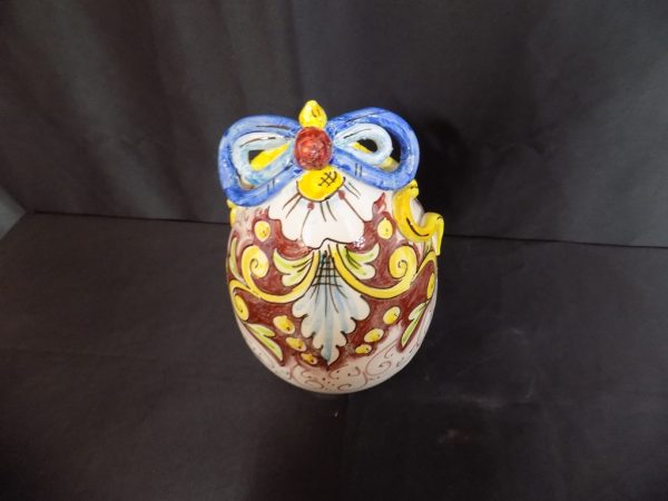 uv-600-uova-di-pasqua-in-ceramica-decorati-a-mano-cn-fondo-rosso-h-cm-22-d-cm-15-e-40.jpg